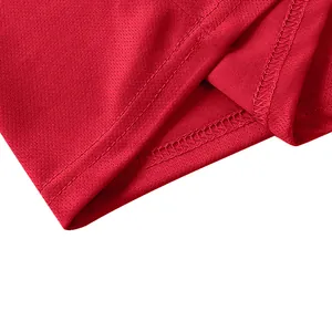 Detail view showing stitching and breathable quick-dry mesh fabric on red polo shirt