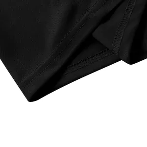 Detail shot of black quick-dry mesh fabric with double-stitched hem and breathable texture