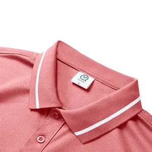 Close-up detail of the ribbed collar and breathable pique fabric on a pink polo shirt