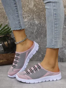 Breathable pink fly-knit mesh mule shoes with white anti-slip sole detail