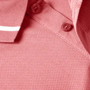Close-up detail of breathable mesh fabric and buttons on a red quick-dry polo shirt