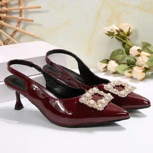 Burgundy patent leather kitten heel slingbacks featuring a luxury pearl and crystal square buckle