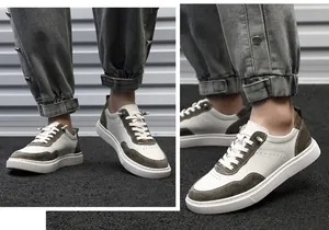 Close-up view of men's retro suede low-top sneakers showing texture and stitching details