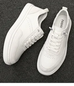 Detailed view of white pigskin suede retro sneakers for men with non-slip soft sole