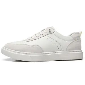 Detailed side view of premium white retro pigskin and suede leather casual sneakers