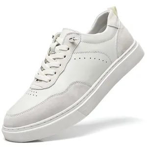 Side view of white and grey men's pigskin suede retro sneakers with soft sole