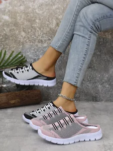 Close-up detail showing the breathable flyknit mesh and slip-on design of casual mules.