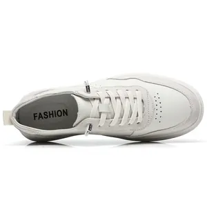 Top-down view of premium white men's pigskin suede sneakers with comfortable soft sole