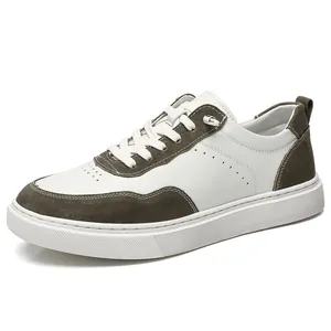 Detailed view of men's retro suede leather low-top casual sneakers in white and green