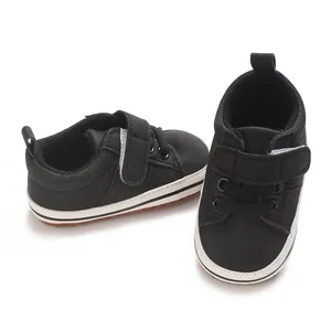 Black infant soft sole walking shoes with velcro straps for baby boys aged 0-1 year