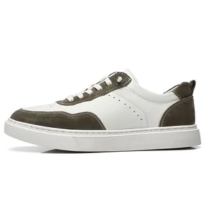 Side view of men's retro sneakers featuring white leather and olive suede