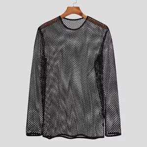Detail showing the intricate black fishnet mesh fabric and drop-shoulder long-sleeved design.
