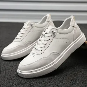 Detail view of retro men's pigskin suede sneakers in off-white with soft soles