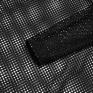 Close-up detail of black mesh texture and cuff on men's see-through long sleeve shirt