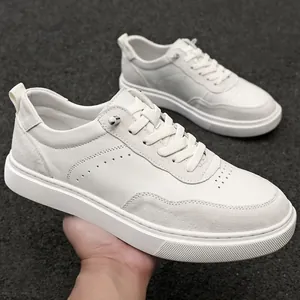 Retro white men's sneakers with premium suede and leather texture for casual wear.