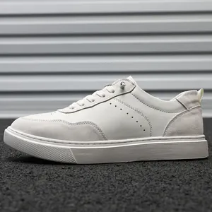 Side view of men's retro pigskin suede low-top sneaker in off-white finish