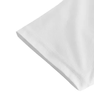 Detailed view of the white pique fabric texture and premium stitching on a polo shirt