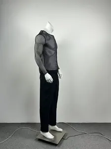 Detailed side view of men's black mesh long sleeve t-shirt with fishnet pattern texture