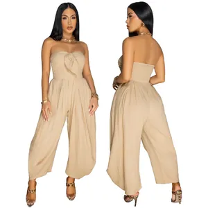 Two-view detail of a sexy beige strapless jumpsuit with bow-knot front and wide legs