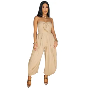 Elegant beige strapless tube top jumpsuit with front knot detail for women