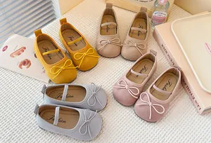 Multi-color girls' Mary Jane flats featuring charming bow details and soft suede finish