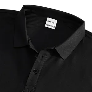 Close-up of black Polo shirt collar with size M label and button detail