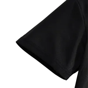Macro view of breathable pique fabric on a black short sleeve polo shirt