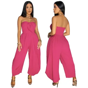 Detailed front and back view of a pink strapless jumpsuit with tie-front detail