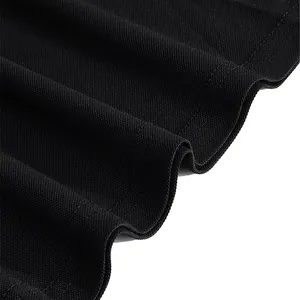Close-up macro detail of black piqué breathable fabric texture for unisex summer polo shirt