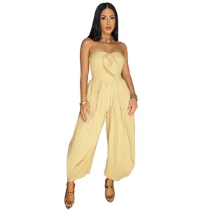 Chic pale yellow strapless tube top jumpsuit with a stylish front tie knot design for summer