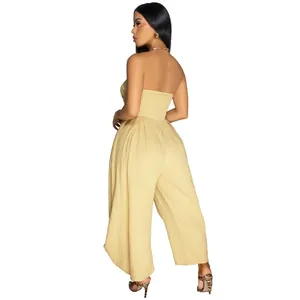 Detailed back view of a summer sexy strapless solid color jumpsuit in beige.