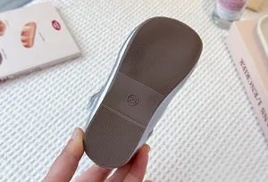 Detailed view of the non-slip brown rubber sole for silver toddler princess shoes