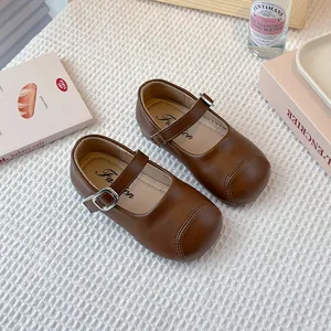 Classic brown Mary Jane shoes for girls with adjustable buckle strap and soft sole