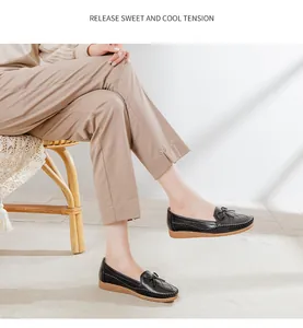 Elegant black breathable flat loafers for women with bow detail and soft sole
