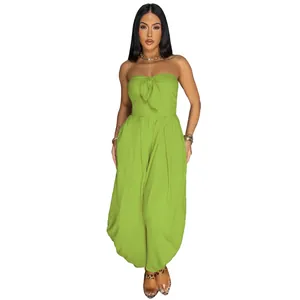 Front view of a stylish lime green strapless jumpsuit featuring a front knot detail