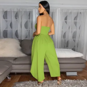 Detailed back view of a lime green strapless wide-leg jumpsuit with textured crinkle fabric