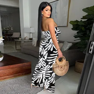 Elegante tuta intera senza spalline con stampa floreale bianca e nera e gamba larga donna