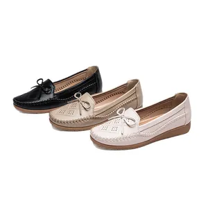 Breathable women's flat loafers in black, khaki, and white for daily work wear
