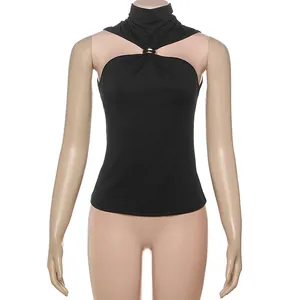 Detail view of black halter top featuring a stylish metal ring accent at the neck.