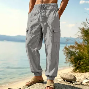 Men's loose fit grey linen cargo pants with side pockets and elastic ankle cuffs