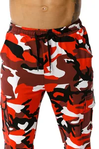 Close-up of men's red camouflage cargo pants with drawstring and pockets detail.