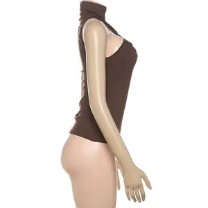 Side view detail of a slim-fit brown halter neck top with metal accent on a mannequin.
