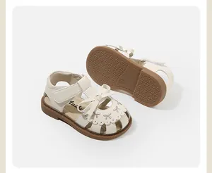 Elegant beige toddler girl sandals featuring a cute bowknot and non-slip rubber sole for summer
