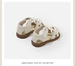 Elegant cream toddler girl sandals featuring bow detail and a flexible soft sole