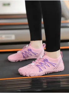 Pink quick-dry water shoes with purple accents for gym or outdoor hiking details