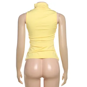 Back view of a yellow slim-fit sleeveless high-neck tank top on a mannequin