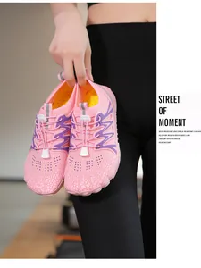 Detailed view of pink quick-dry water shoes with breathable mesh and quick-lace system