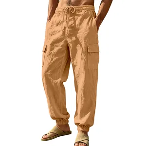 Detailed view of men's loose linen cargo pants with elastic cuffs and multi-pockets