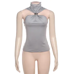 Elegant sleeveless grey halter neck turtleneck top with a metallic ring detail on a mannequin
