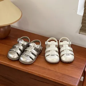 Soft sole toddler girl's summer sandals with closed toe design in silver and white colors